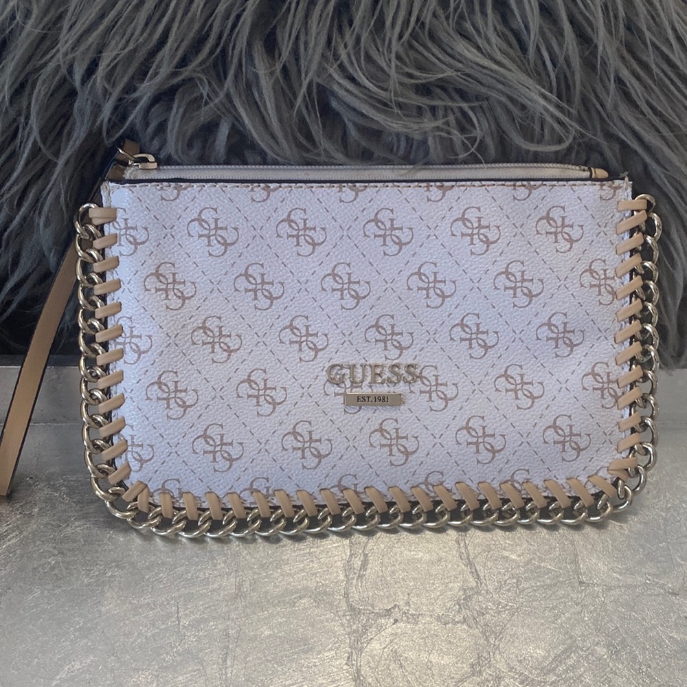 Vintage Guess wristlet with silver hardware.